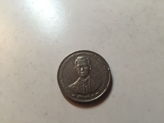 Asian-Coin-With-The-Same-Men-On-The-Obverse